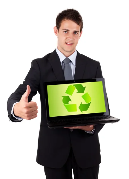 Ung affärsman hålla laptop med återanvända ikonen — Stockfoto
