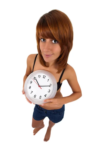 Mladá žena s hodinami — Stock fotografie