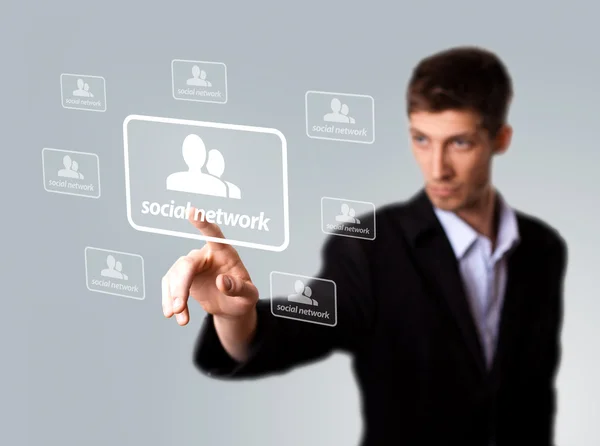 Üzletember viszont sürgetőbb társadalmi hálózat jel — Stock Fotó