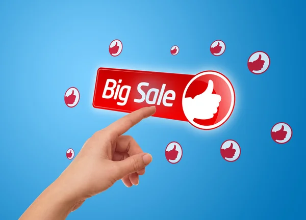 Hand pressing big sale button — Stock Photo, Image