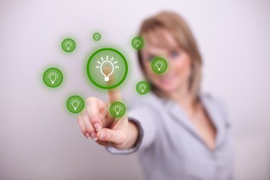 Woman pressing idea button with one hand clipart
