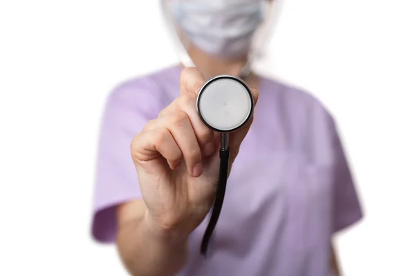 Vrouwelijke arts houden stethoscoop wees naar camera 3 — Stockfoto