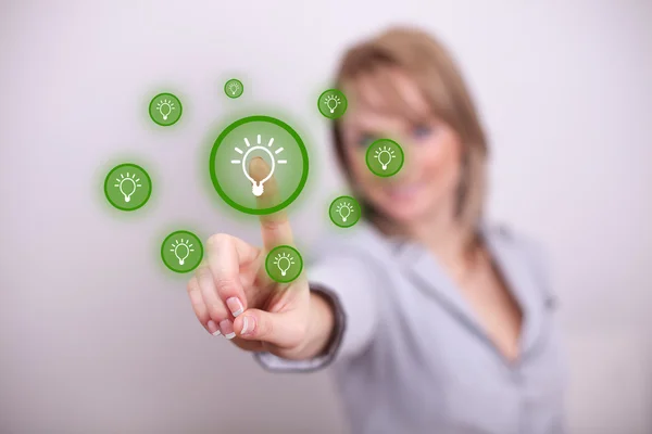 Woman pressing idea button with one hand — Stock Photo, Image