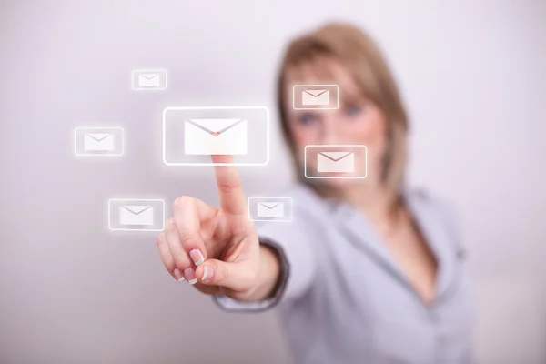 Mulher pressionando envelope de e-mail com números botão — Fotografia de Stock