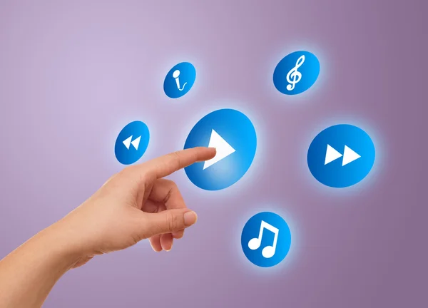 stock image Hand pressing meida player button