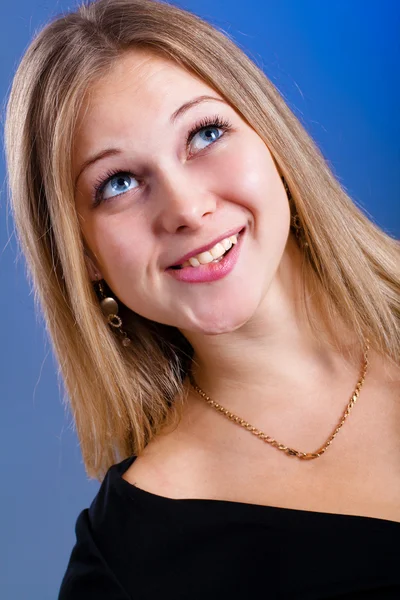 Pretty young woman thinking — Stock Photo, Image