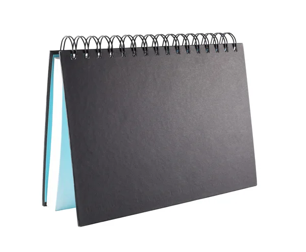Schwarzes Notizbuch als Desktop-Kalender mit leerem Kopierraum — Stockfoto