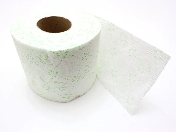 Rolo branco de papel higiênico isolado em material branco ; — Fotografia de Stock