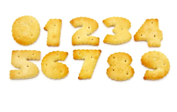Biscoitos amarelos na forma de números — Fotografia de Stock