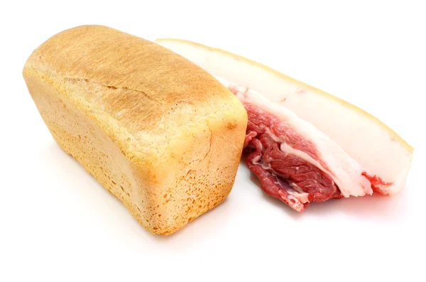 Roll van vers brood en het grote stuk — Stockfoto