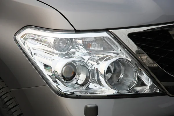 Close-up van auto koplamp — Stockfoto