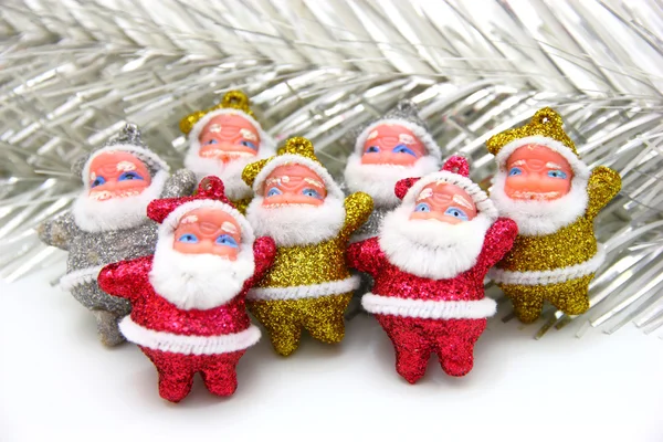 Some dolls of Santa Claus are together — Stock Photo, Image