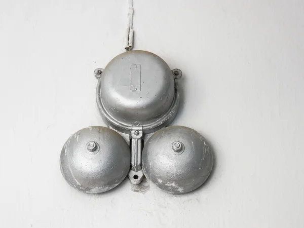 Big old silvery school bell — Stock Photo, Image