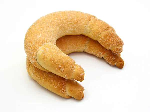 Čerstvé croissanty se trousili cukrem — Stock fotografie