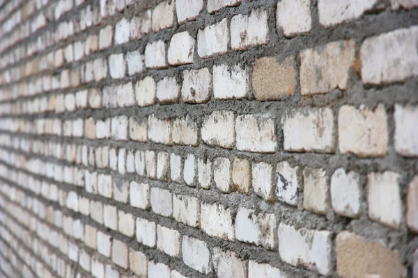 Oude witte bakstenen muur — Stockfoto