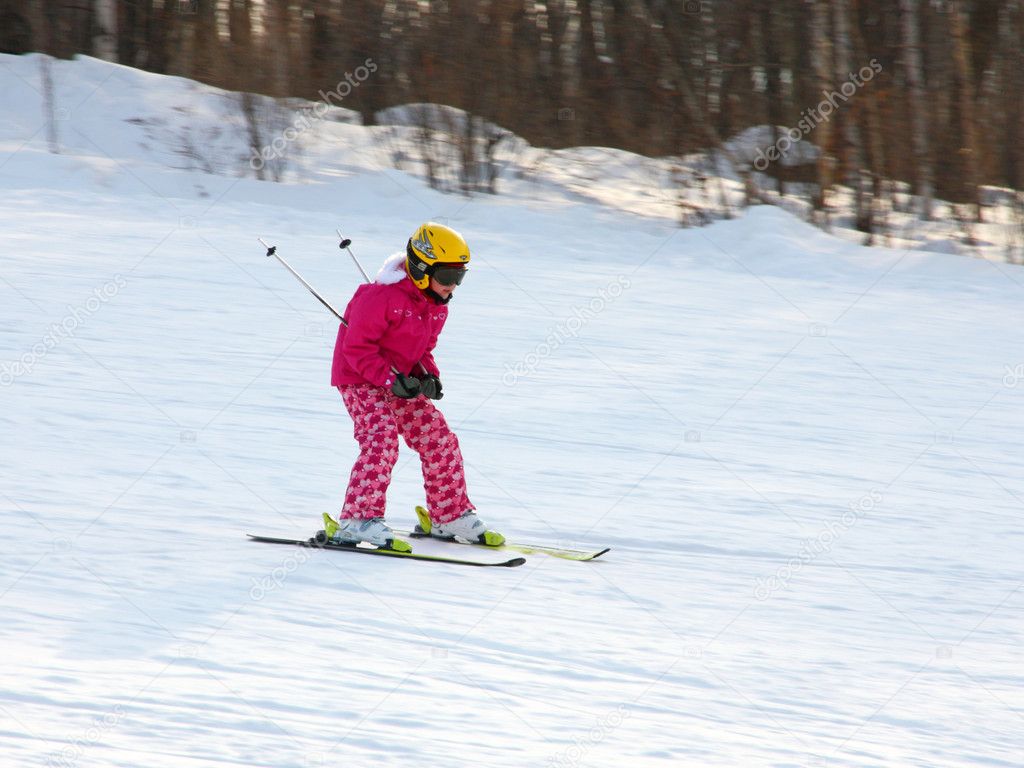 Little girl skiing downhill — Stock Photo © aarrows 4661756