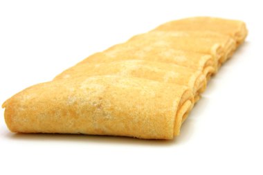 Fried pancakes stuffed isolated on the plate on white background clipart