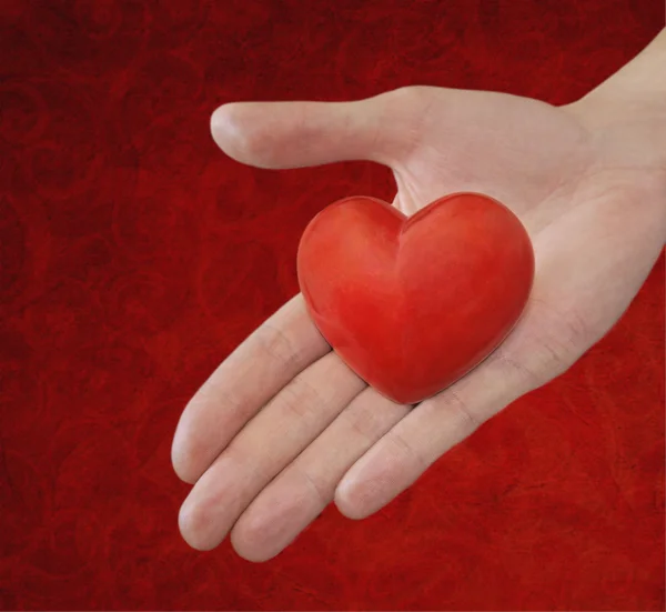 Stock image Red heart in the hand