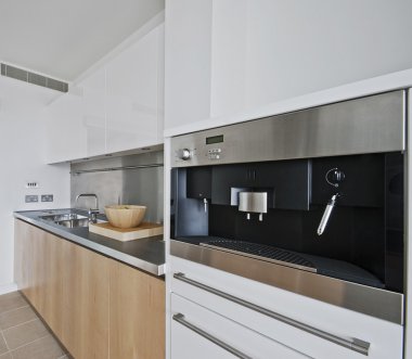 Kitchen with built in coffee machine clipart