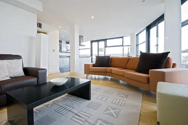 Living room with orange sofa — Stock Photo, Image