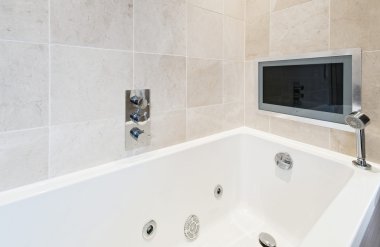 Bath tub with tv clipart