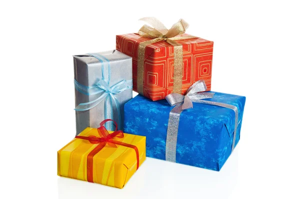 Multi-coloured boxes with gifts, it is isolated on white — Stock Photo, Image