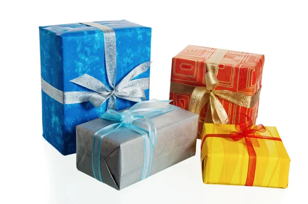 Multi-coloured boxes with gifts, it is isolated on white — Stock Photo, Image