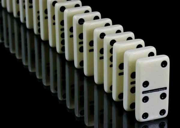 Domino tiles on black — Stock Photo, Image