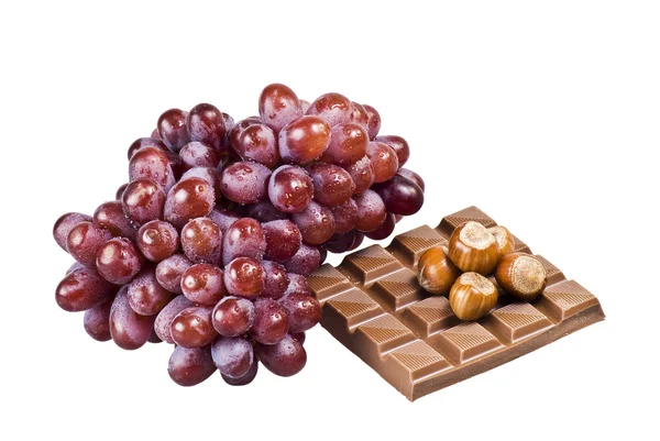 Schokolade, Nüsse und Trauben — Stockfoto
