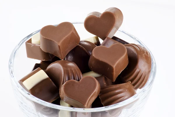 Glass bowl of chocolates — Stock Photo, Image