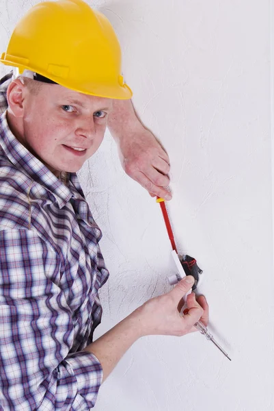 stock image Electrician fitting light switch