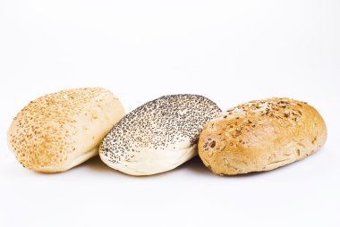 Three different kind of rolls isolated over white