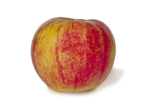 Красное сочное яблоко на белой заднице — стоковое фото