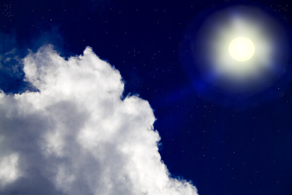 Night sky. The moon in the starry sky illuminates the clouds