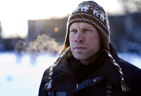 Portrait of breathing man in winter hat