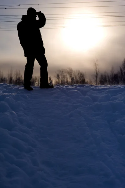Silhouette of man in winter — Stock Photo, Image