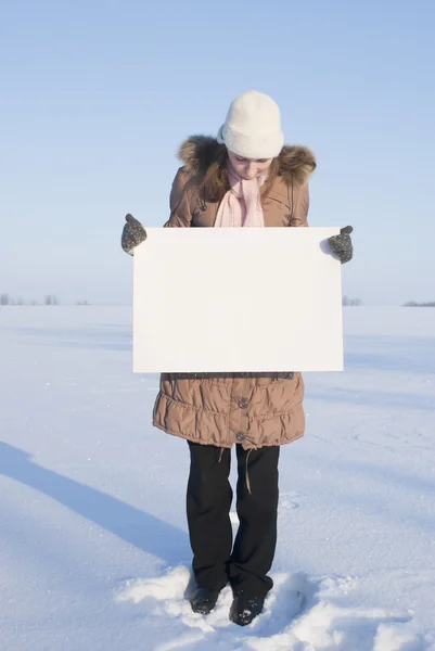 Girl Holding White Poster Winter Snowy Field — Stock Photo, Image