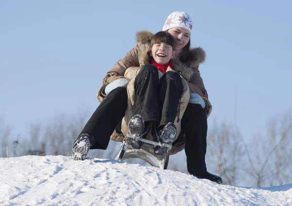 Two Happy Sisters Sledding Winter Time — Stock Photo, Image