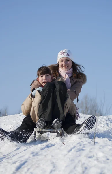 Two Happy Sisters Sledding Winter Time — Stock Photo, Image