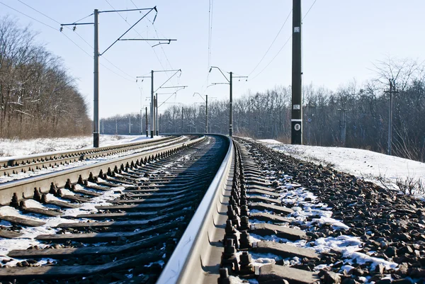 Spoorweg in wintertijd — Stockfoto