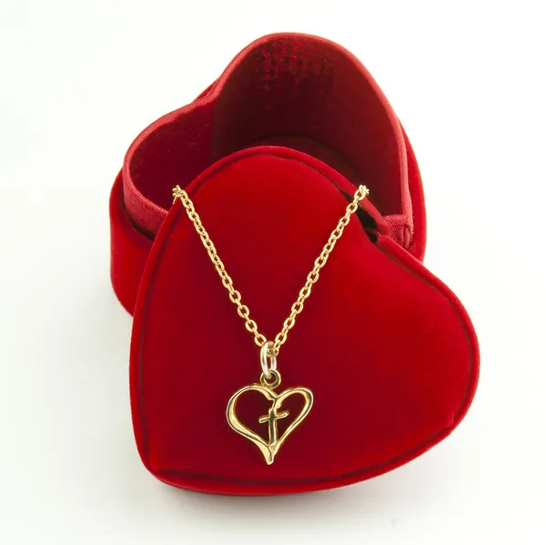 Necklace and heart shaped red box — Stock Photo, Image