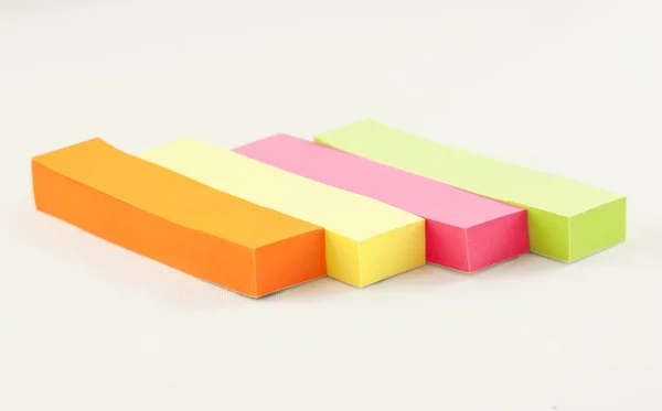 Quatre bâtons de papier colorés — Photo