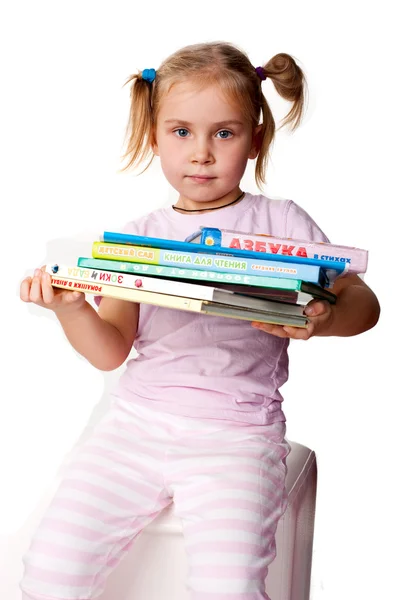 Piękna dziewczyna z stos książek — Zdjęcie stockowe