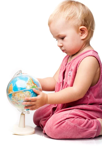 Beautiful baby holding a globe — Stock Photo, Image