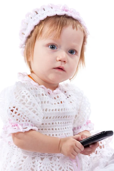 เด็กที่สวยงามกับโทรศัพท์มือถือ — ภาพถ่ายสต็อก