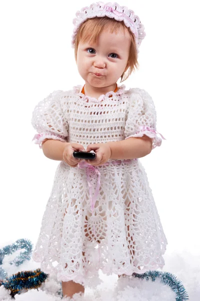 Beautiful baby with a mobile phone — Stock Photo, Image