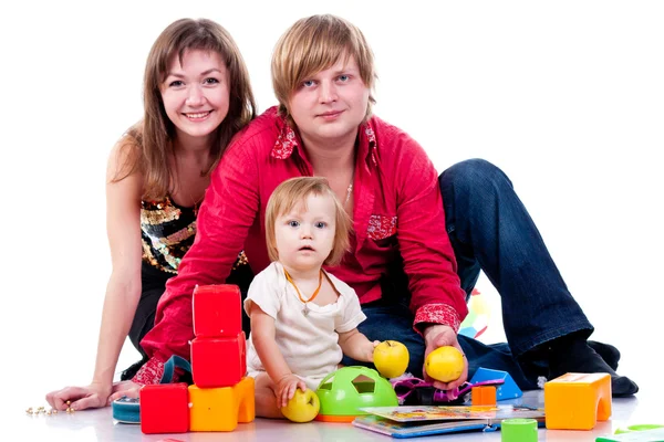 Familie spielt mit Spielzeug — Stockfoto