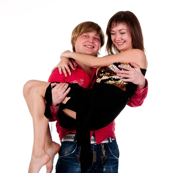 Young man holding a young woman in hands — Stock Photo, Image