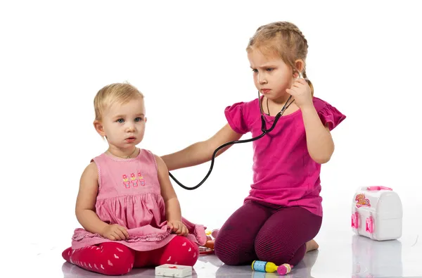 Children Playing Doctor Doll Isolated White — Stock Photo, Image