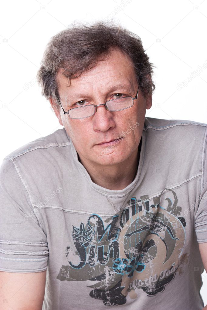 Portrait of a handsome senior man in glasses looking at camera